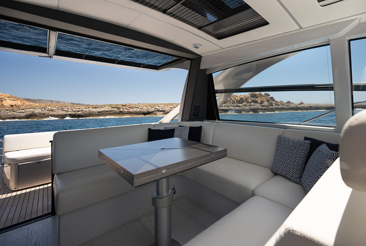 Sofa inside the Pershing 5x yacht