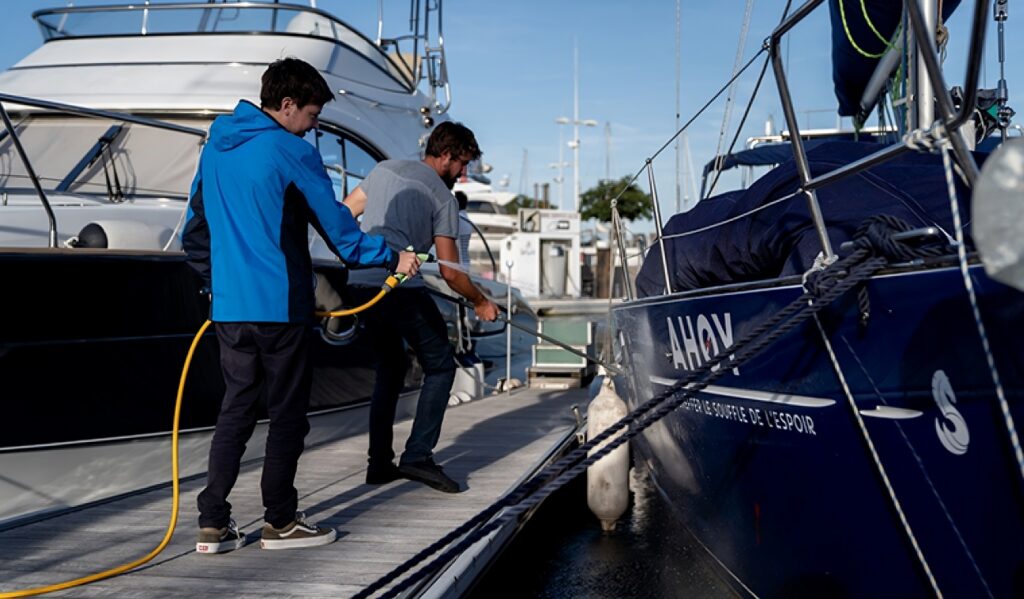 naizur cleaning a yacht