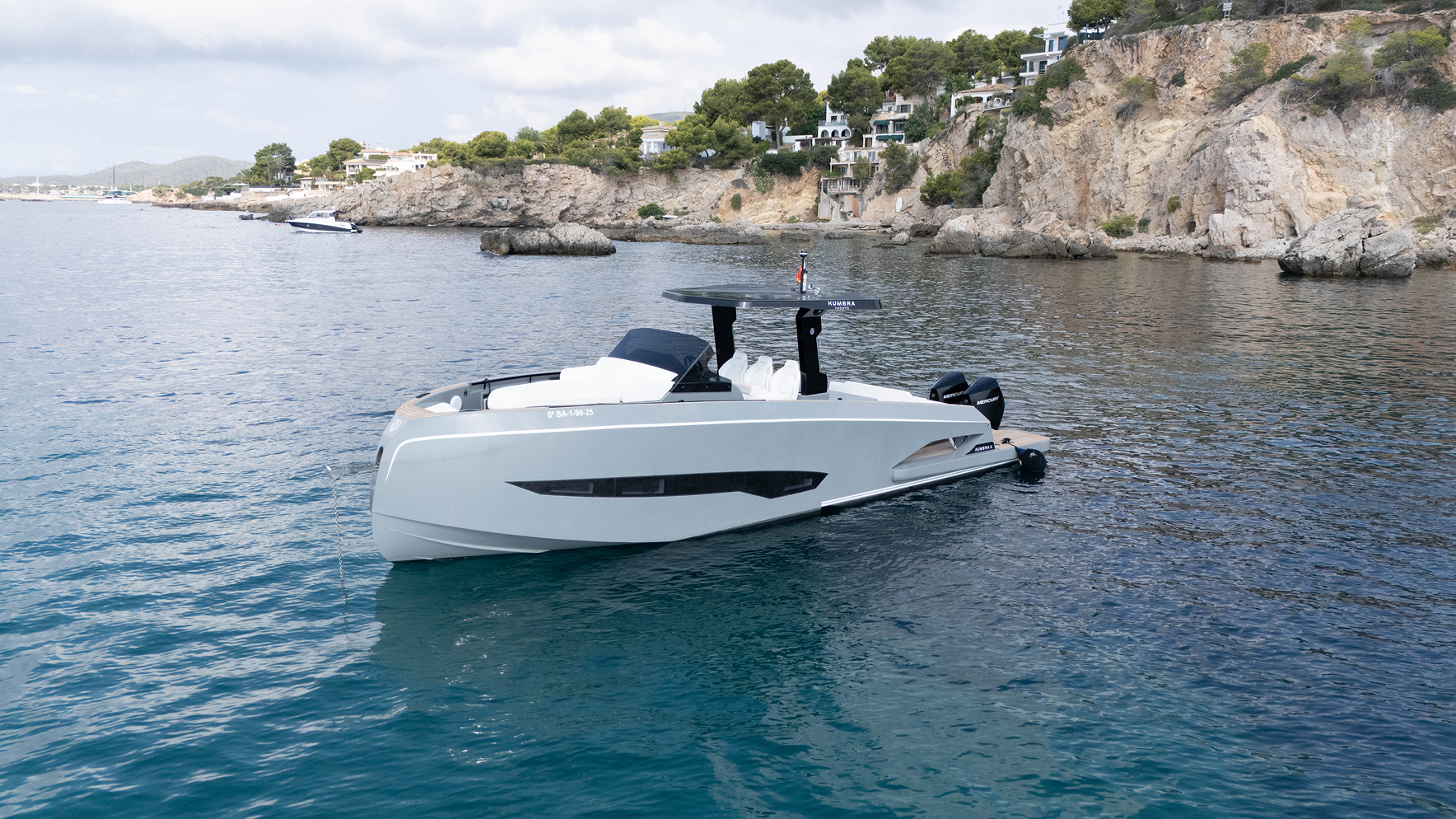 Kumbra 34 yacht near a beach